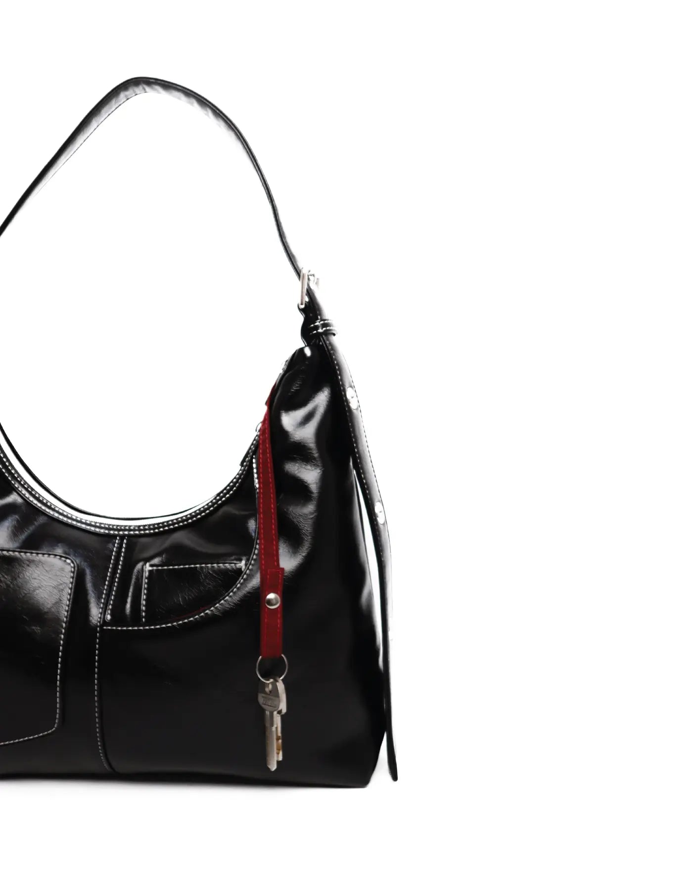 SIGNATURE POCKET LEATHER HOBO BAG IN BLACK TSL Singapore