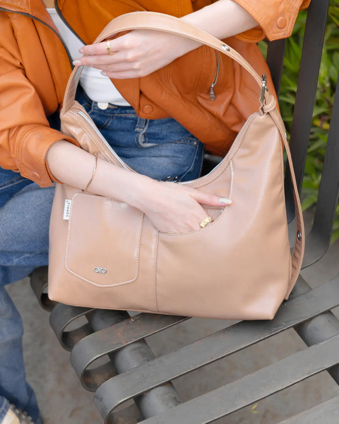 SIGNATURE POCKET LEATHER HOBO BAG IN MILK TEA TSL Singapore