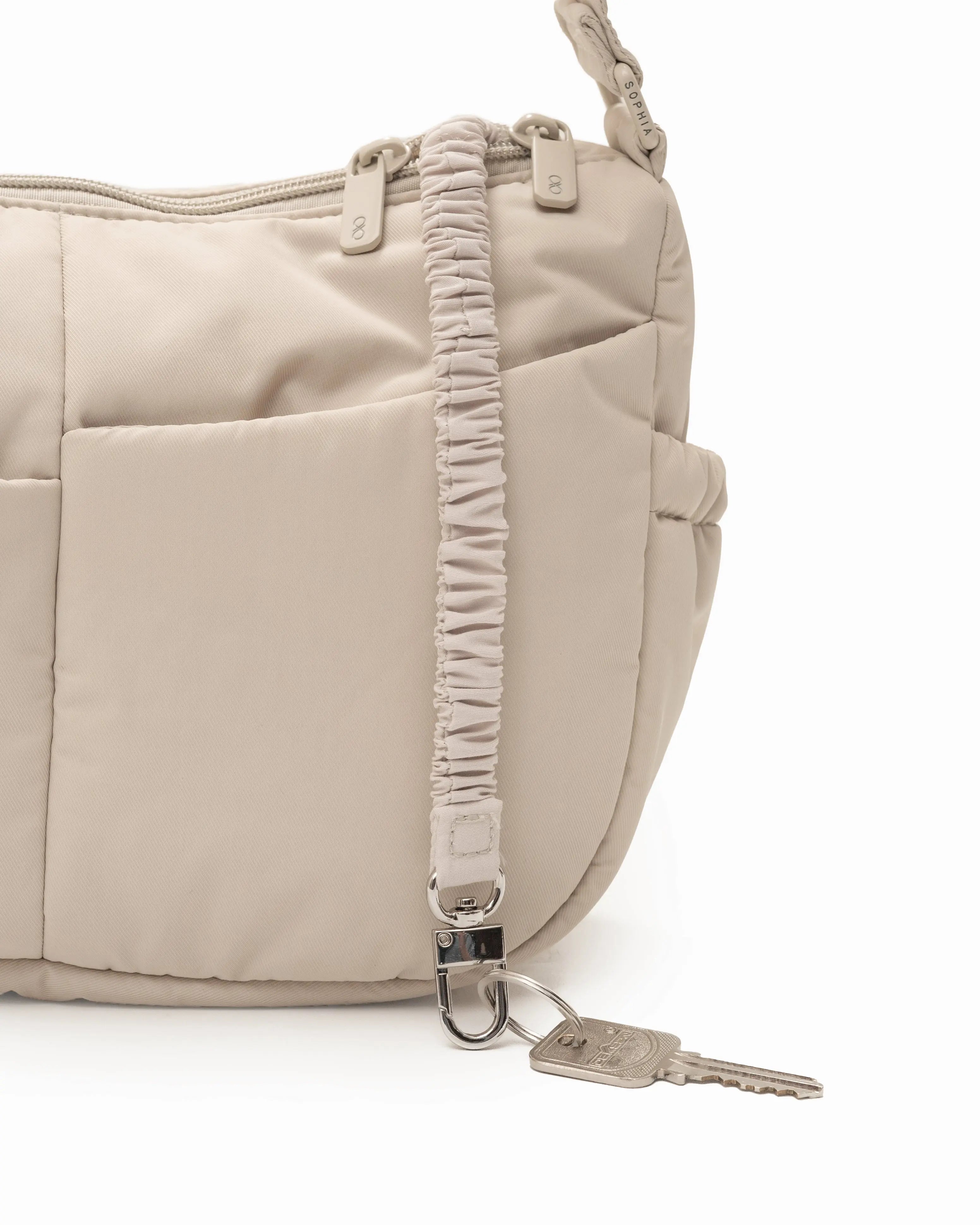 MINI SIGNATURE POCKET CROSSBODY BAG IN POSH OAT 