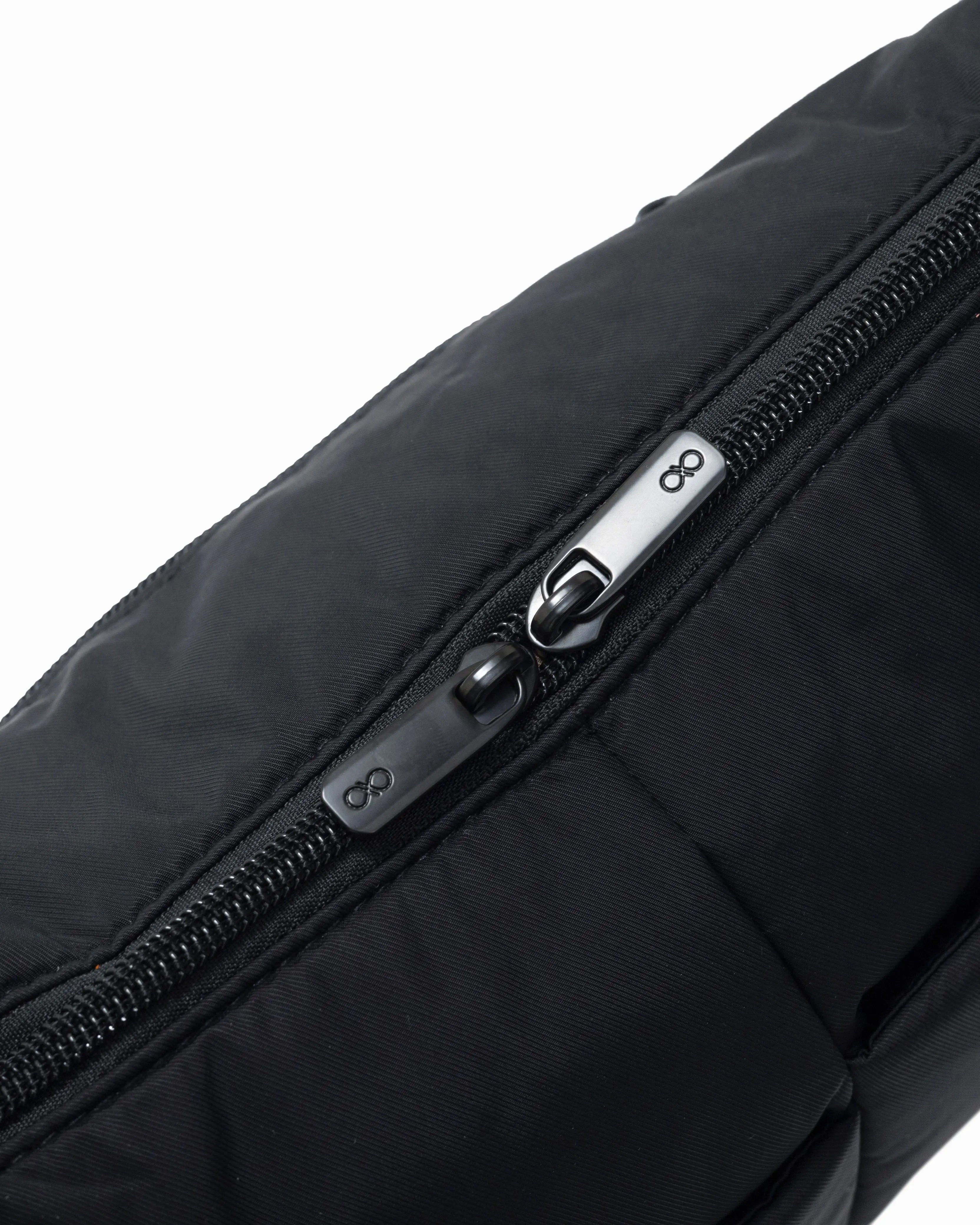 MINI SIGNATURE POCKET CROSSBODY BAG IN POSH JET BLACK 