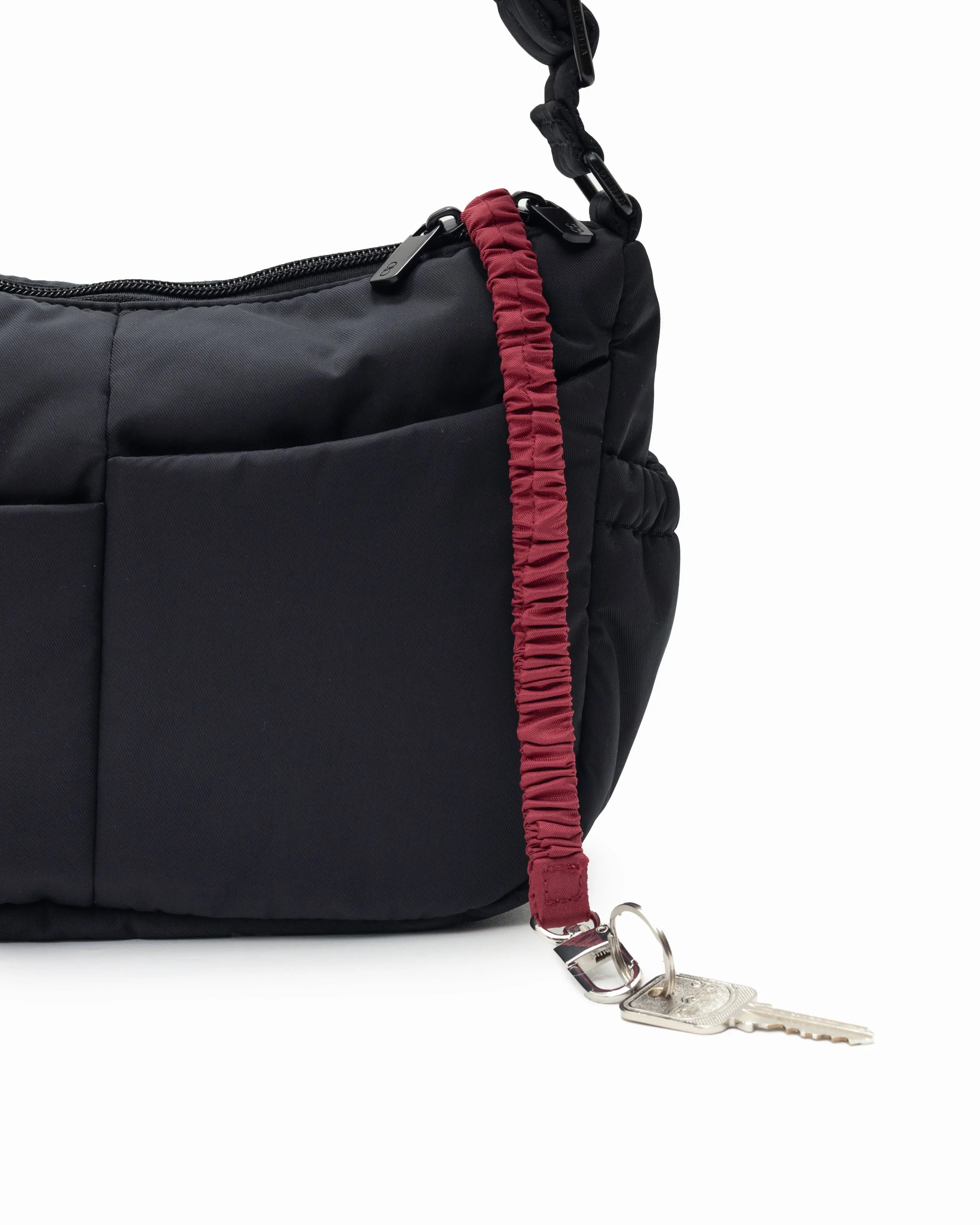 MINI SIGNATURE POCKET CROSSBODY BAG IN POSH JET BLACK 