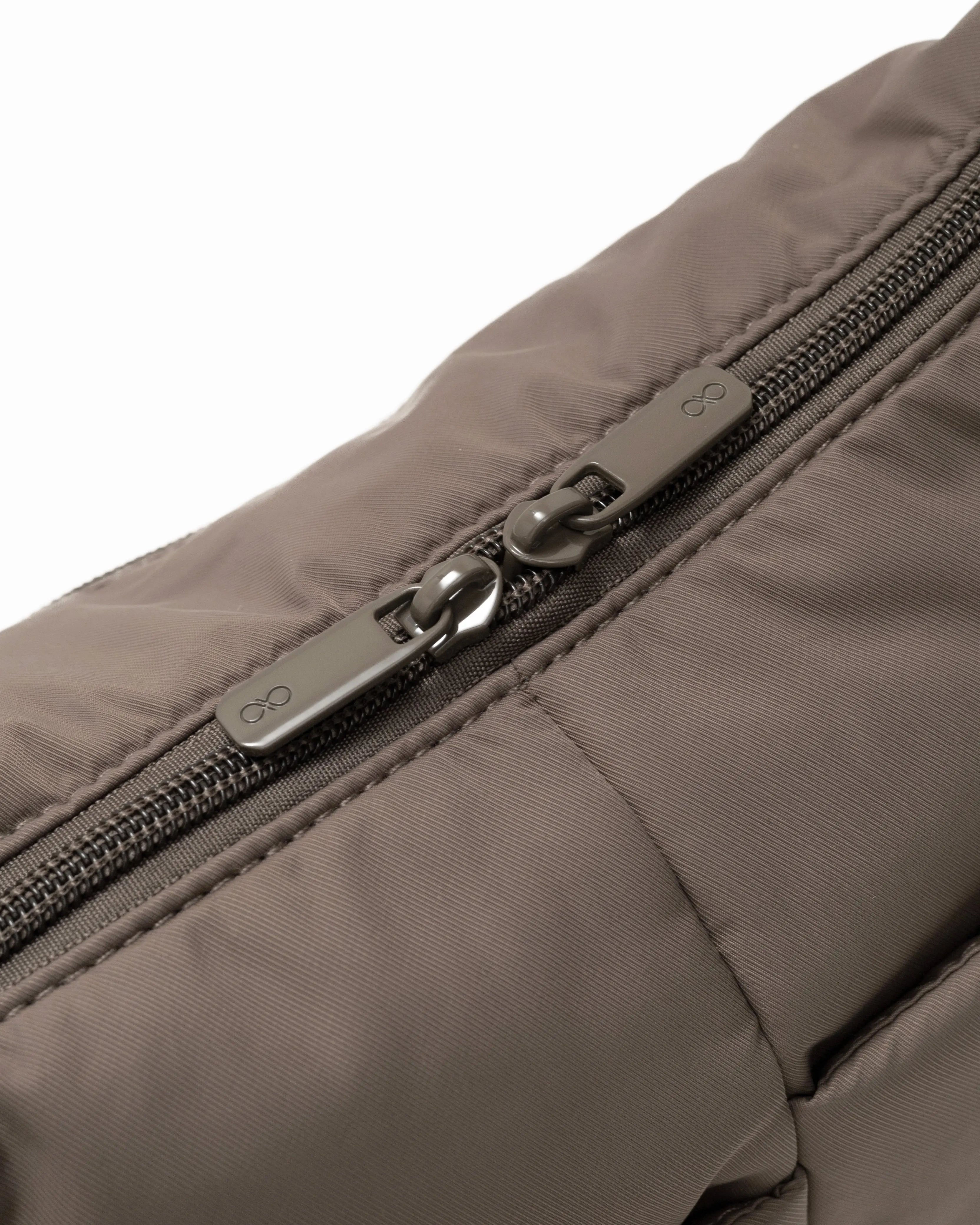 MINI SIGNATURE POCKET CROSSBODY BAG IN POSH TAUPE 