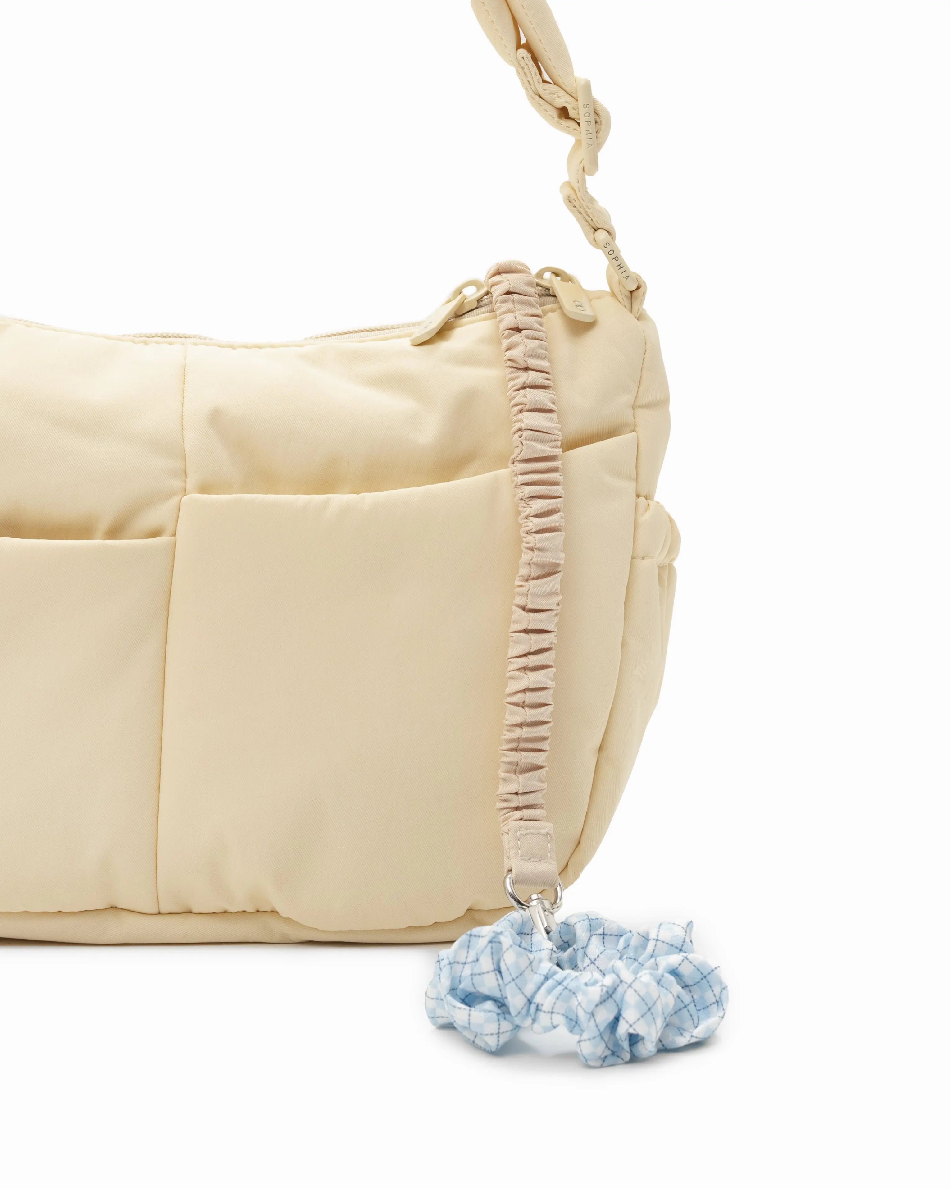 MINI SIGNATURE POCKET CROSSBODY BAG IN POSH MELLOW 
