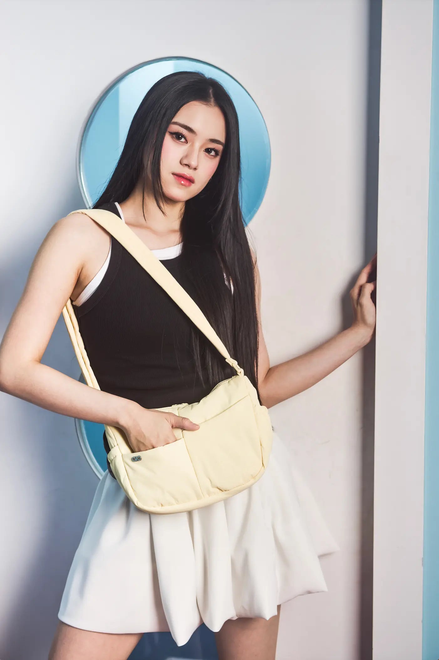 MINI SIGNATURE POCKET CROSSBODY BAG IN POSH MELLOW 
