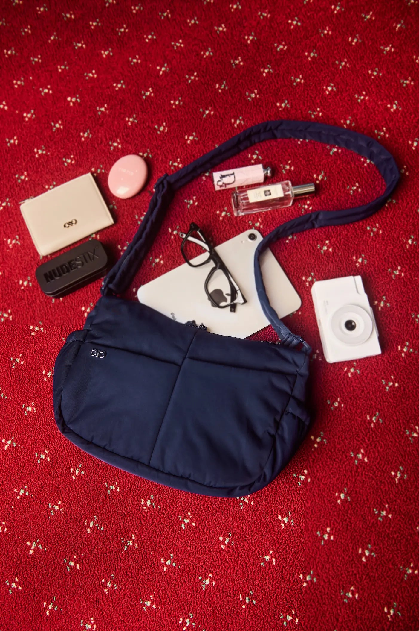 MINI SIGNATURE POCKET CROSSBODY BAG IN POSH MIDNIGHT 